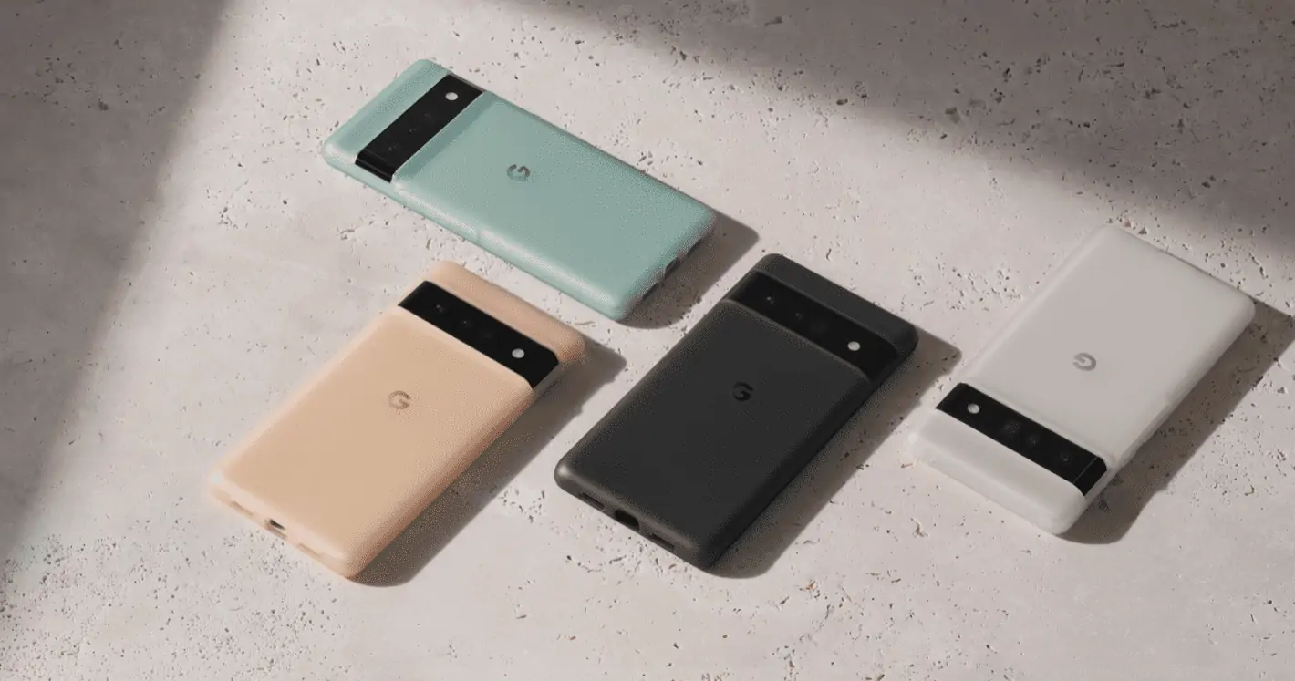 Quatre smartphones Google Pixel en vert menthe, beige, noir et blanc, disposés sur une surface en béton avec une bande noire pour les caméras.